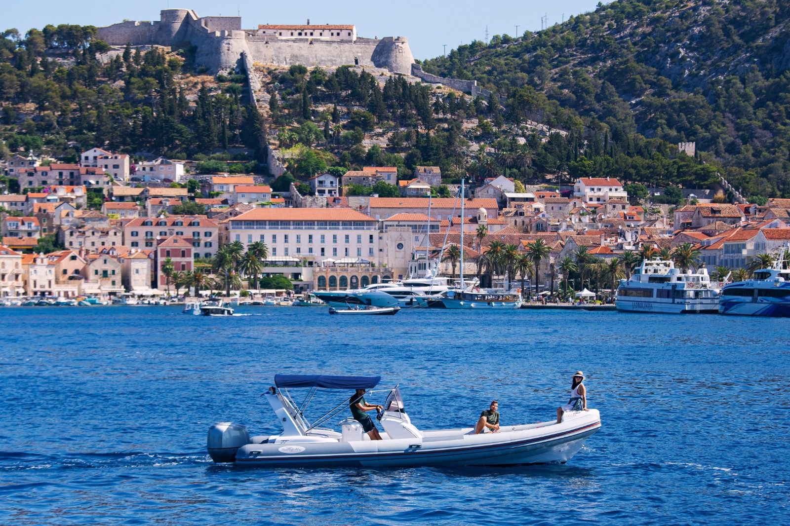 Speedboat cruising the Adriatic sea near Hvar Town, Croatia